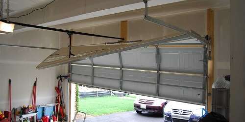 GARAGE DOOR TRACK REPAIR 1